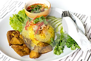 Chicken Rice Curry With Coconut called Koa Mook Gai photo