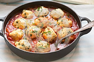 Chicken and ricotta meatballs in tomato sauce