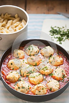 Chicken and ricotta meatballs in tomato sauce