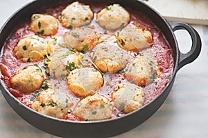 Chicken and ricotta meatballs in tomato sauce