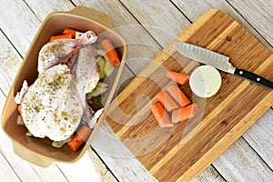 Chicken and roasting vegetables ready to prepare traditional family dinner