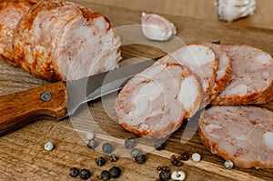 Chicken roll on a chopping board