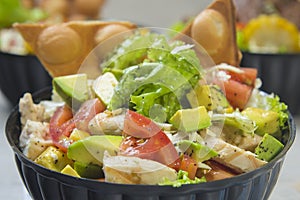 Chicken salad, avocado, tomato lettuce and bubble waffles