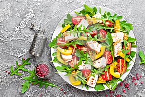 Chicken salad. Meat salad with fresh tomato, sweet pepper, arugula and grilled chicken breast. Chicken fillet with fresh vegetable