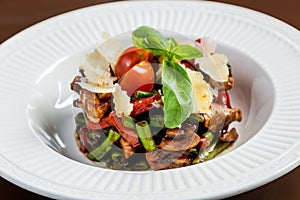 Chicken salad with vegetables and parmesane