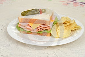 Chicken sandwich with pickle skewer photo