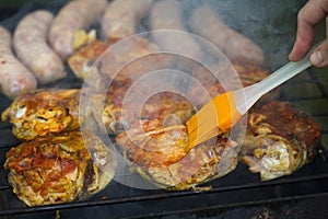 Chicken Sausages being grilled on an outdoor barbecue for that S