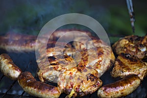 Chicken Sausages being grilled on an outdoor barbecue for that S
