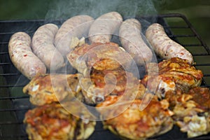 Chicken Sausages being grilled on an outdoor barbecue for that S