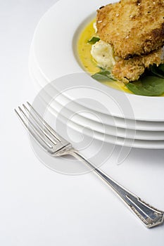 Chicken schnitzel; with angled antique fork