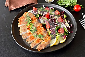 Chicken schnitzel and vegetable salad