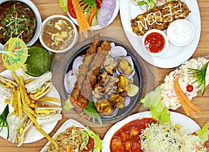 chicken shawarma platter, beef seekh kabab, chicken malai boti, chicken tikka, chicken manchurian, fried riceclub sandwich served