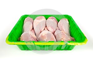 Chicken shin in tray isolated on white background