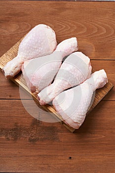 Chicken shin on the wooden table