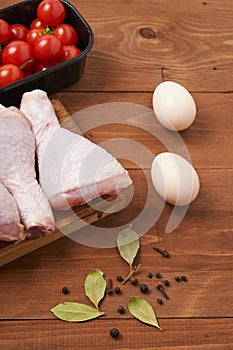 Chicken shin on the wooden table