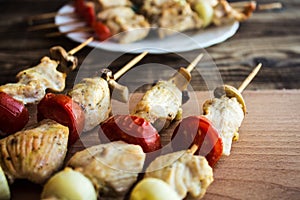 Chicken shish kebab with tomato and mushroom barbecue