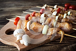 Chicken shish kebab with tomato and mushroom barbecue