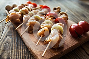 Chicken shish kebab with tomato and mushroom barbecue