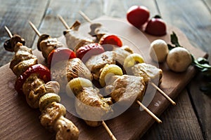 Chicken shish kebab with tomato and mushroom barbecue