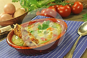 Chicken soup with chicken skewers, bread and noodles