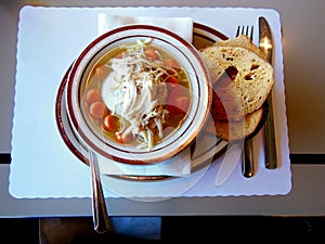 Chicken Soup with a Matzo-Ball and Bagels