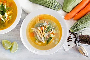 Chicken soup and in white bowl mexican food broth in mexico city