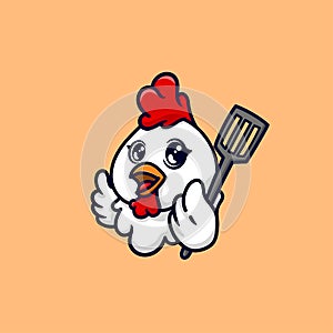 chicken with spatula logo maskot photo