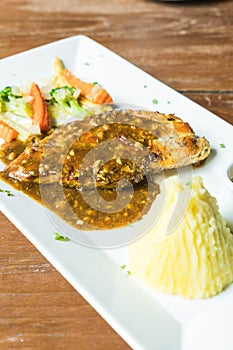 chicken steak with mashed potato