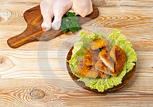 Chicken Strips, Breaded Nuggets on Wood Plate, Crispy Fry Chicken Meat with Lettuce, Fried Crunchy Fillet Pieces