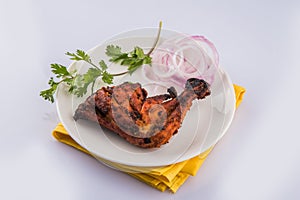 Chicken tandoori or barbecue chicken leg photo