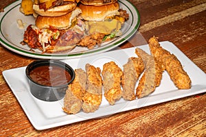 Chicken Tenders with a side of bbq sauce