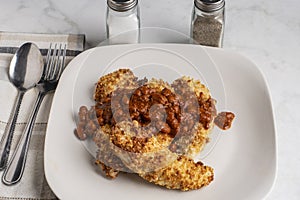 chicken tenders top with chilli