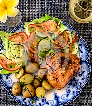 Chicken thigh with salad