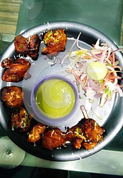 Chicken tikka, chatni and salad