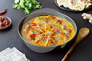 Chicken tikka masala curry with herbs and peppers. Indian food. National cuisine