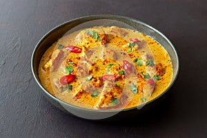 Chicken tikka masala curry with herbs and peppers. Indian food. National cuisine