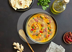 Chicken tikka masala curry with herbs and peppers. Indian food. National cuisine