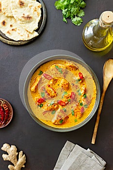 Chicken tikka masala curry with herbs and peppers. Indian food. National cuisine