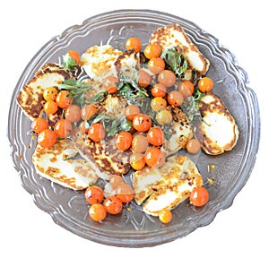 Chicken tomato salad on a plate - isolated image