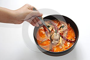 Chicken tomyum the favourite spicy food in thailand with spoon a