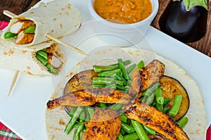 Chicken tortilla with beans and red curry