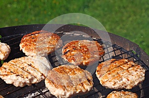 Chicken or turkey burgers for hamburger on grill