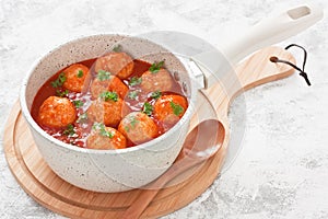 Chicken or turkey homemade delicious meatballs in tomato sauce