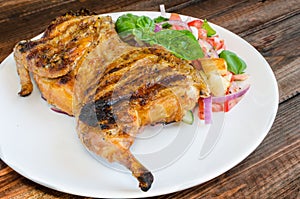 Chicken under a brick with panzanella salad