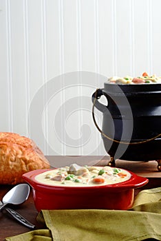Chicken vegetable cream soup with bread