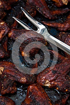 Chicken wings baked in dark soy sauce