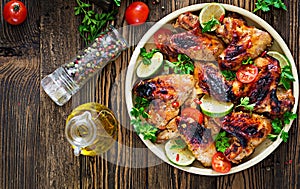 Chicken wings of barbecue in sweetly sour sauce. Picnic.