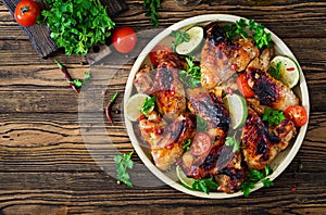 Chicken wings of barbecue in sweetly sour sauce. Picnic.