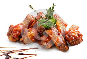 Chicken wings with barbeque sauce photo