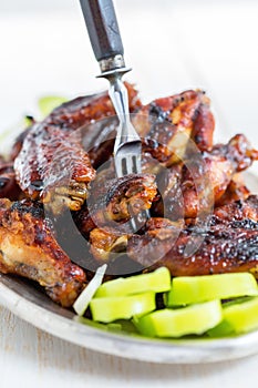 Chicken wings with honey-ginger sauce.